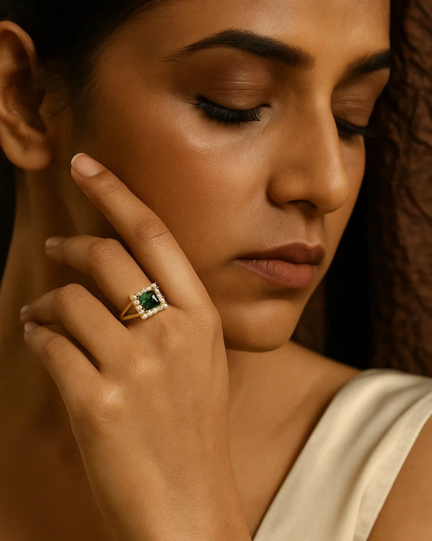 Gold Ring with Emerald Centerpiece
