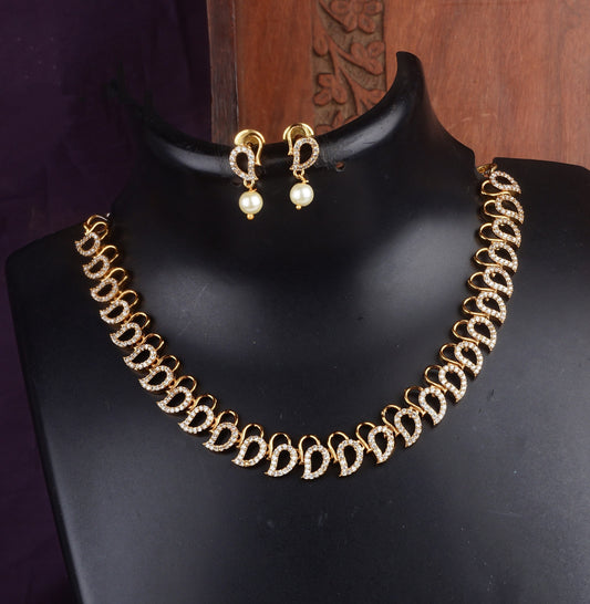 Pear-Shaped Diamond Necklace with Pearl Earrings