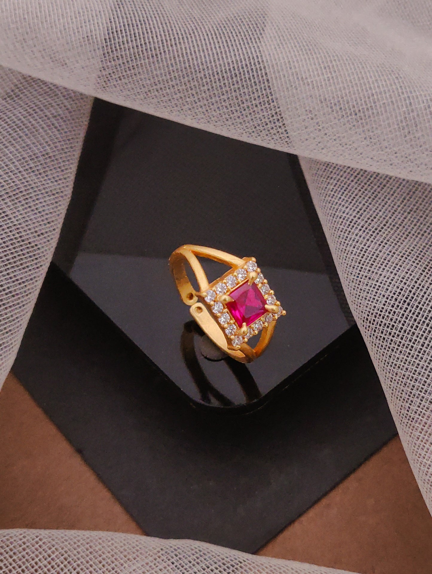 Gold Ring with Ruby Centerpiece