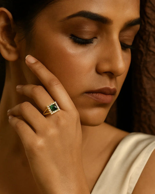 Gold Ring with Emerald Centerpiece