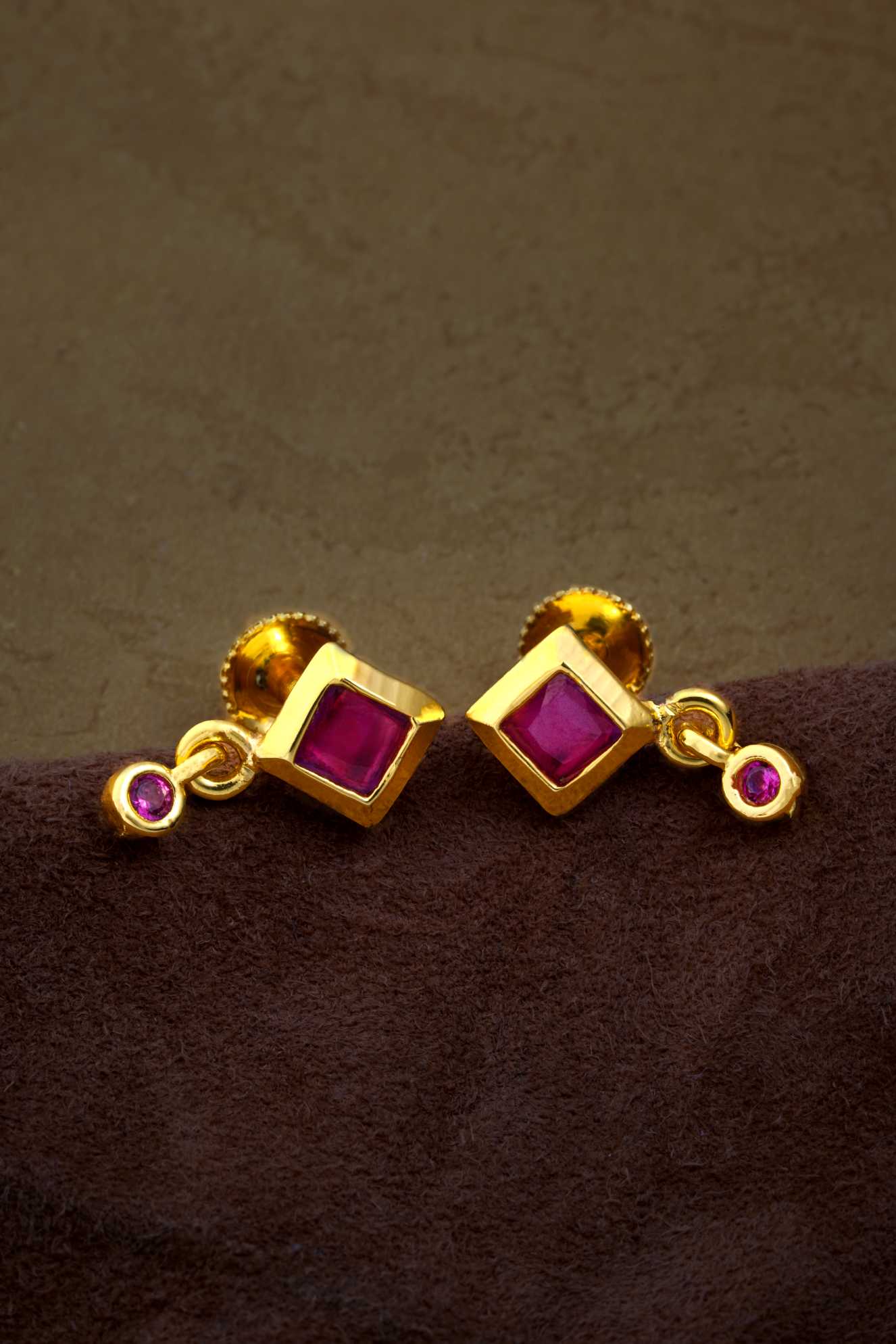 Harmony in Magenta: Gemstone Earrings with Geometric Elegance