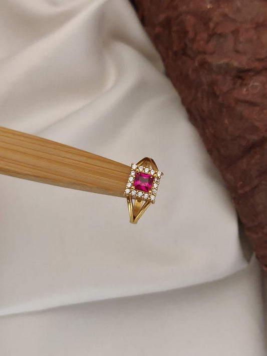 Gold Ring with Ruby Centerpiece