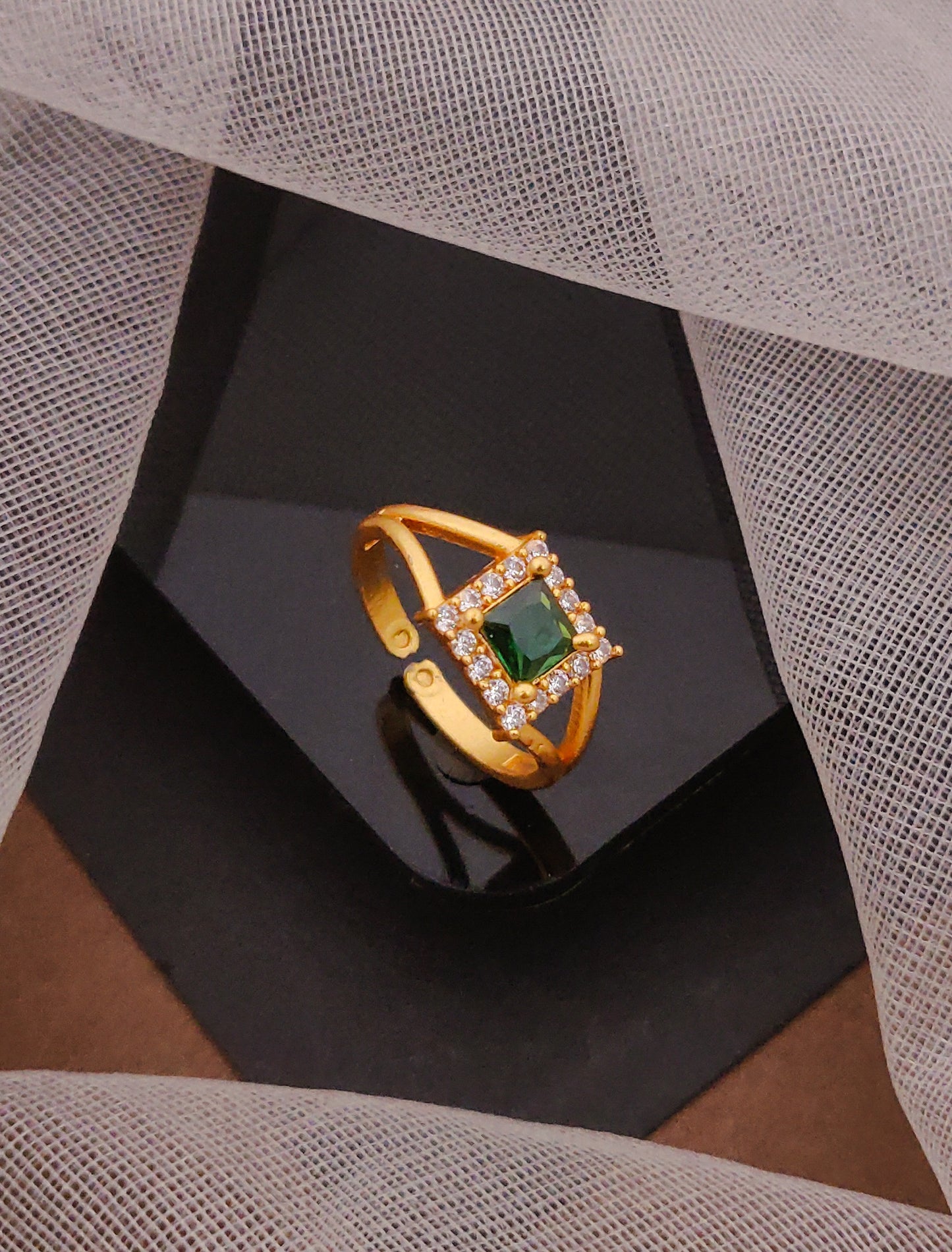 Gold Ring with Emerald Centerpiece